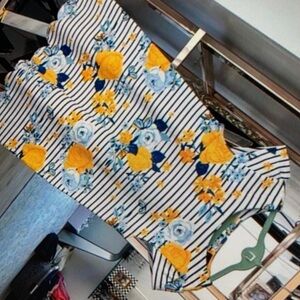 Vibrant floral pattern sleeveless blouse